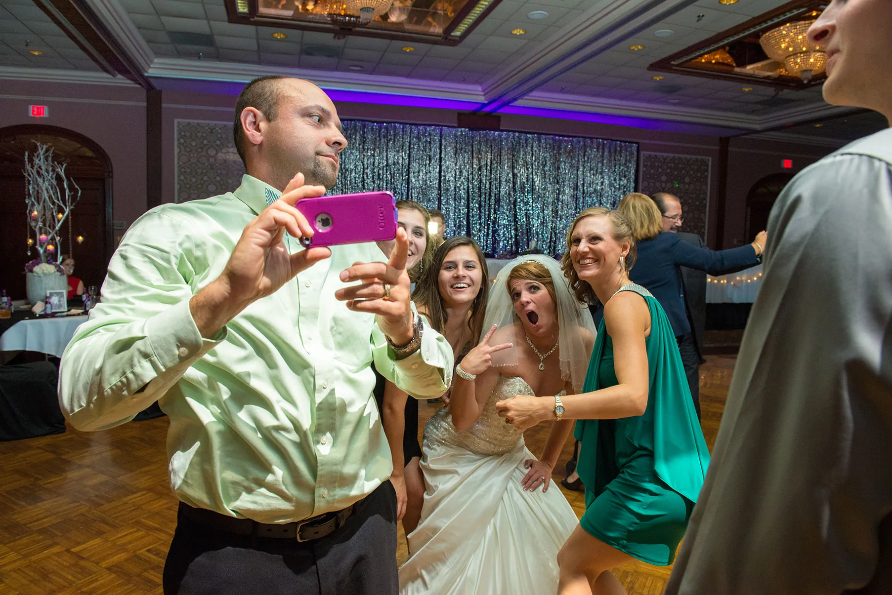 A Madcap Milwaukee DJ keeping a packed reception dancing